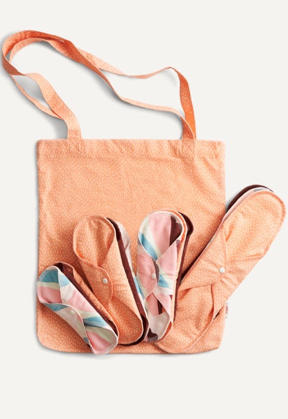 Kit de démarrage — serviettes hygiéniques, oranges mouchetées